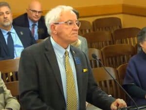 Mike O'Neal testifies on HB 2612, which proposes loss of accreditation for not following state law.